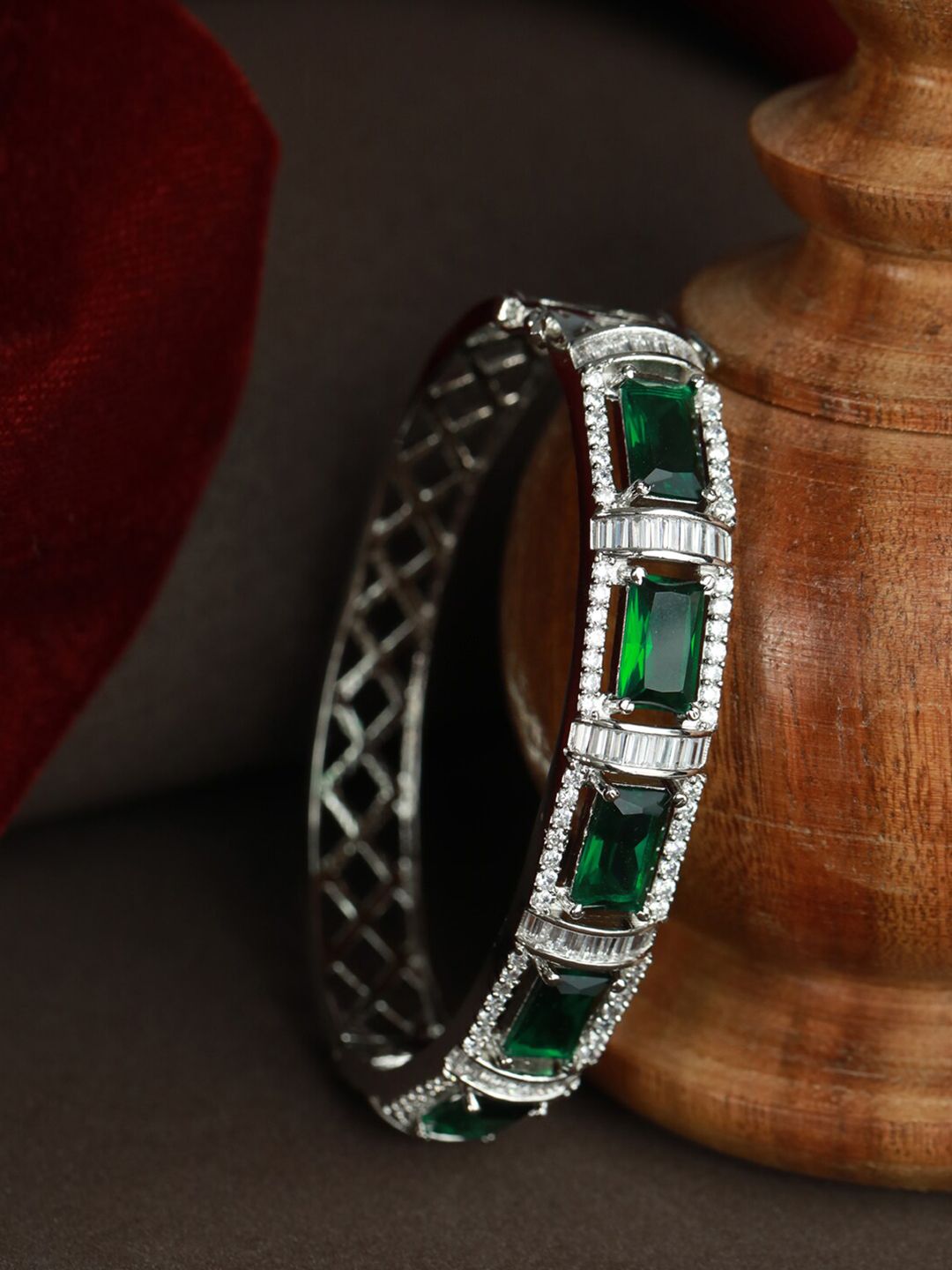 Priyaasi Women Silver-Toned & Green Brass American Diamond Silver-Plated Bangle-Style Bracelet Price in India