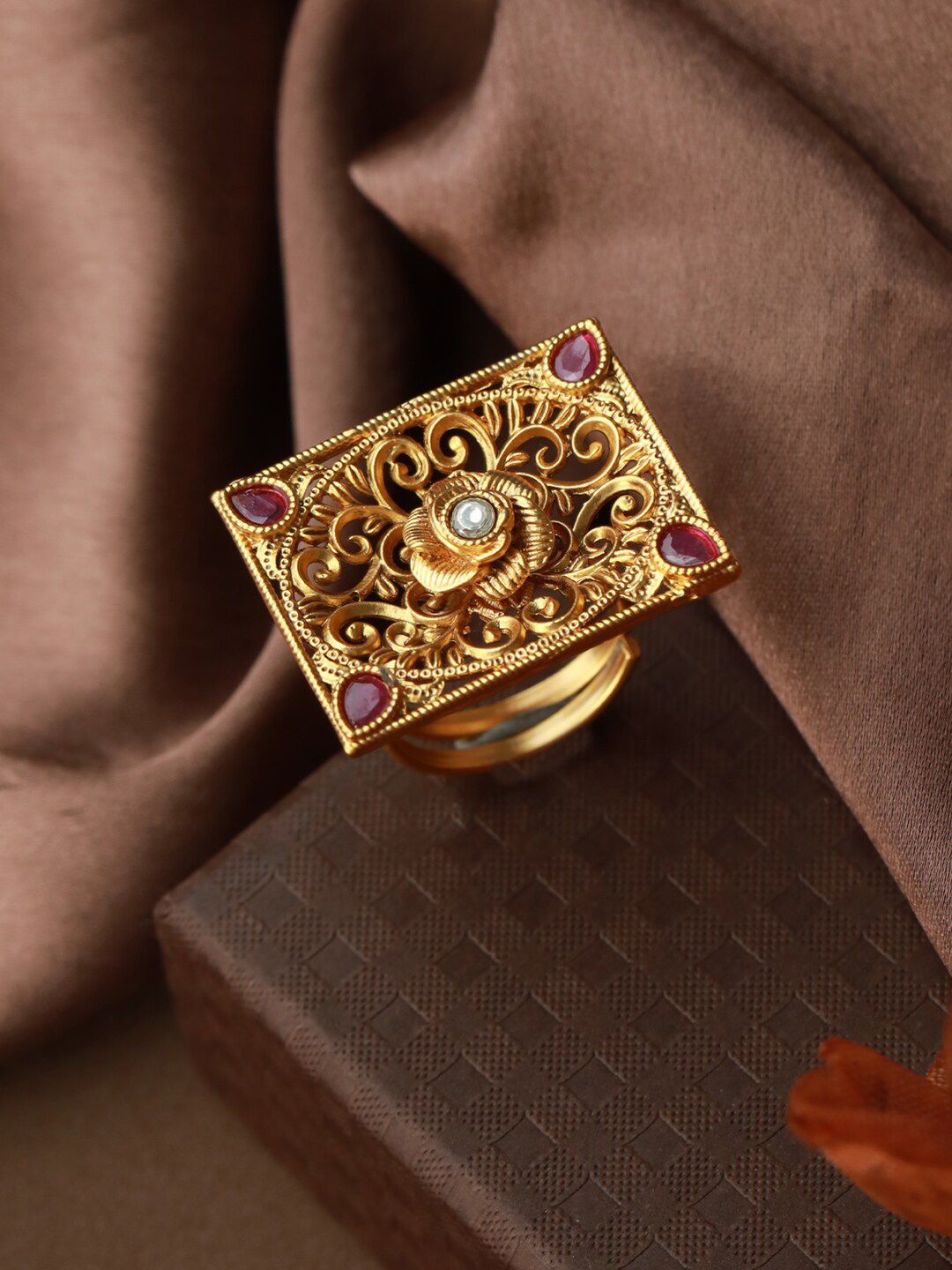 Priyaasi Women Gold Plated Pink Stone Studded Geometric Finger Ring Price in India