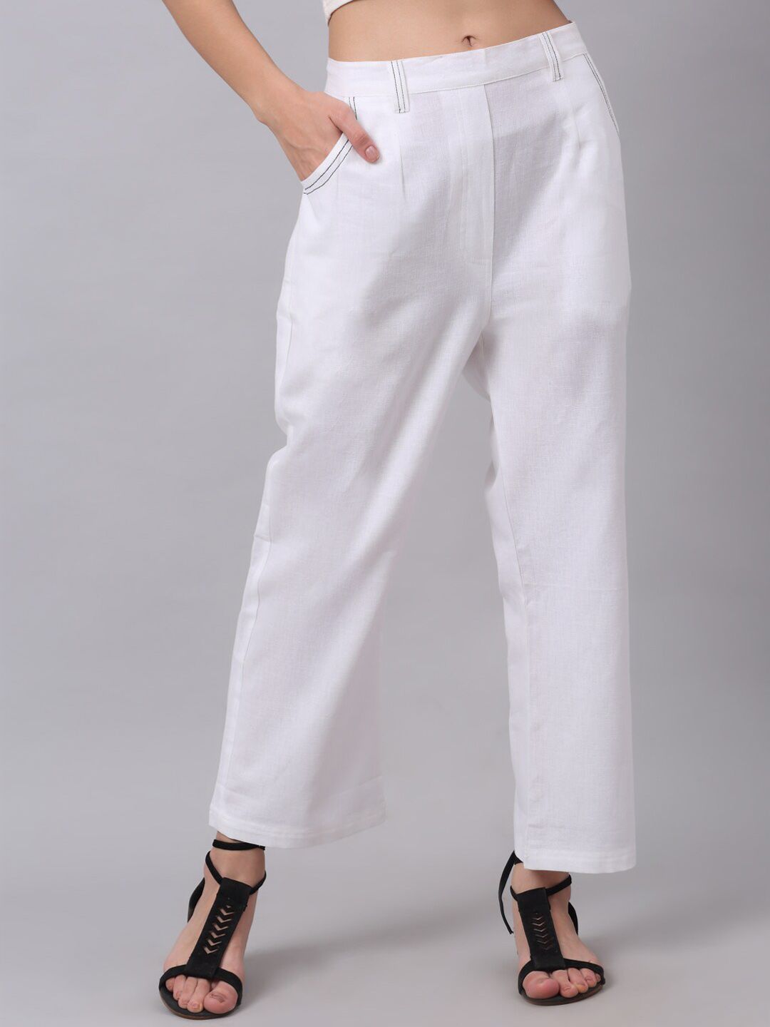 NEUDIS Women White Solid Regular Cotton Trousers Price in India