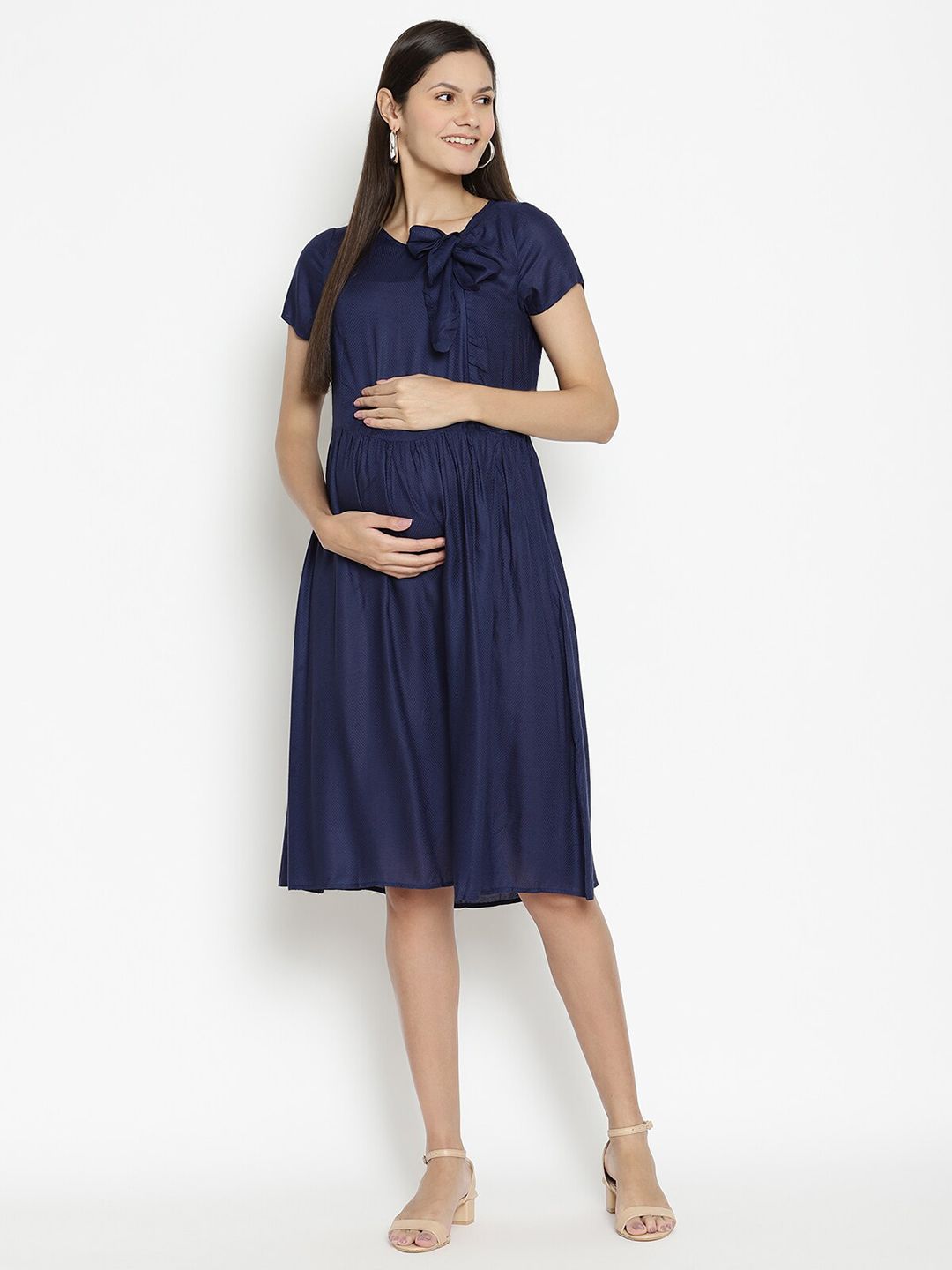 The Vanca Women Navy Blue Solid Tie-Up Neck Maternity Fit & Flare Dress Price in India