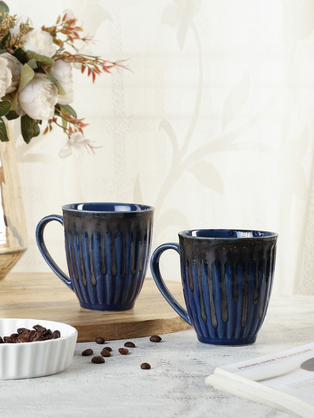 VarEesha Set of 2 Blue & Black Textured Ceramic Glossy Mugs Price in India