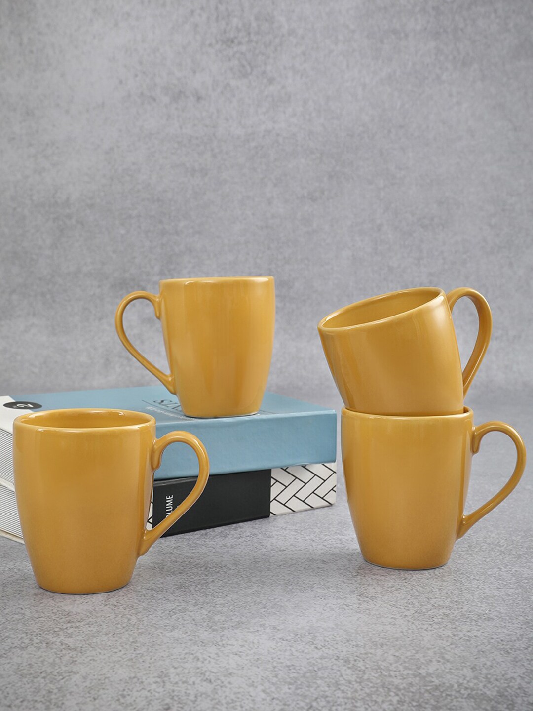 HomeTown Yellow Solid Ceramic Matte Cups Set of Cups and Mugs Price in India