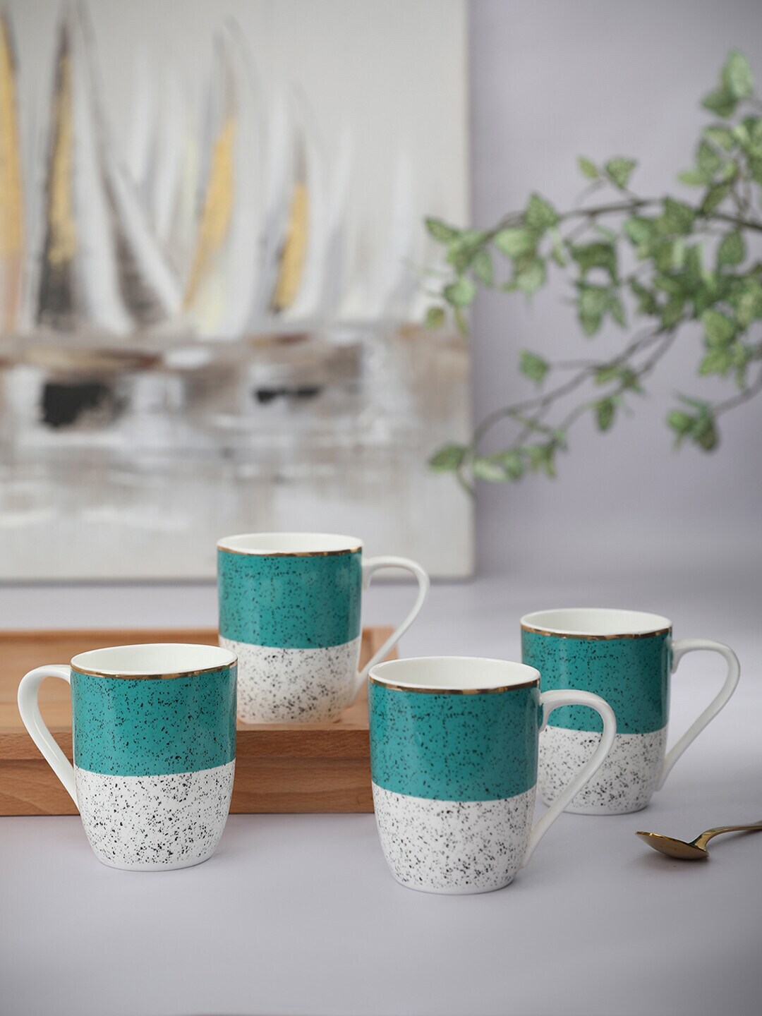 HomeTown White & Green Printed Ceramic Matte Cups Set of Cups and Mugs Price in India