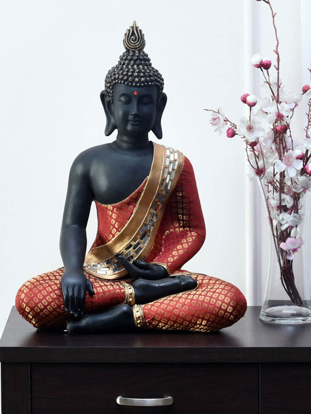 Athome by Nilkamal  Black & Red Sitting Budha Showpieces Price in India