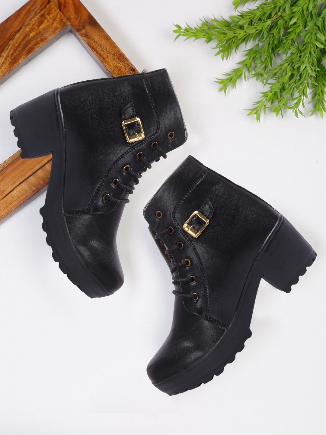 FASHIMO Women Black Solid High Top Heeled Boots Price in India