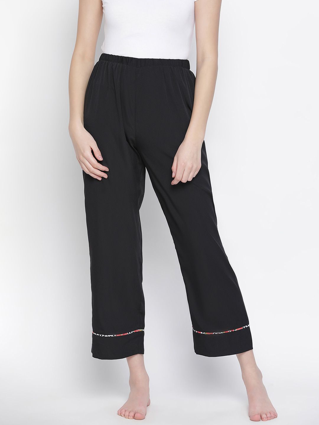 Oxolloxo Women Black Solid Satin Lounge Pants Price in India