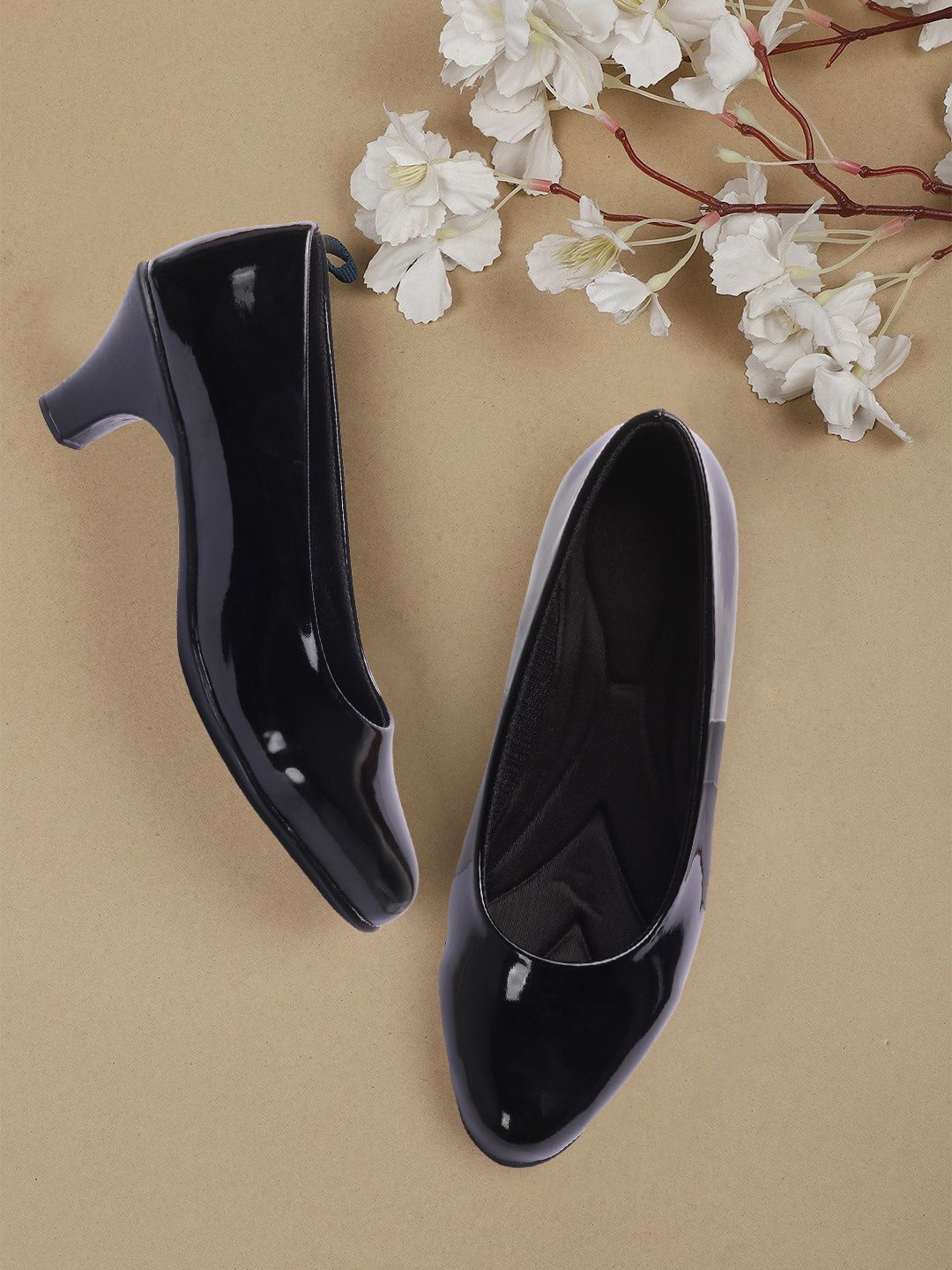 FASHIMO Black Solid Pumps Price in India