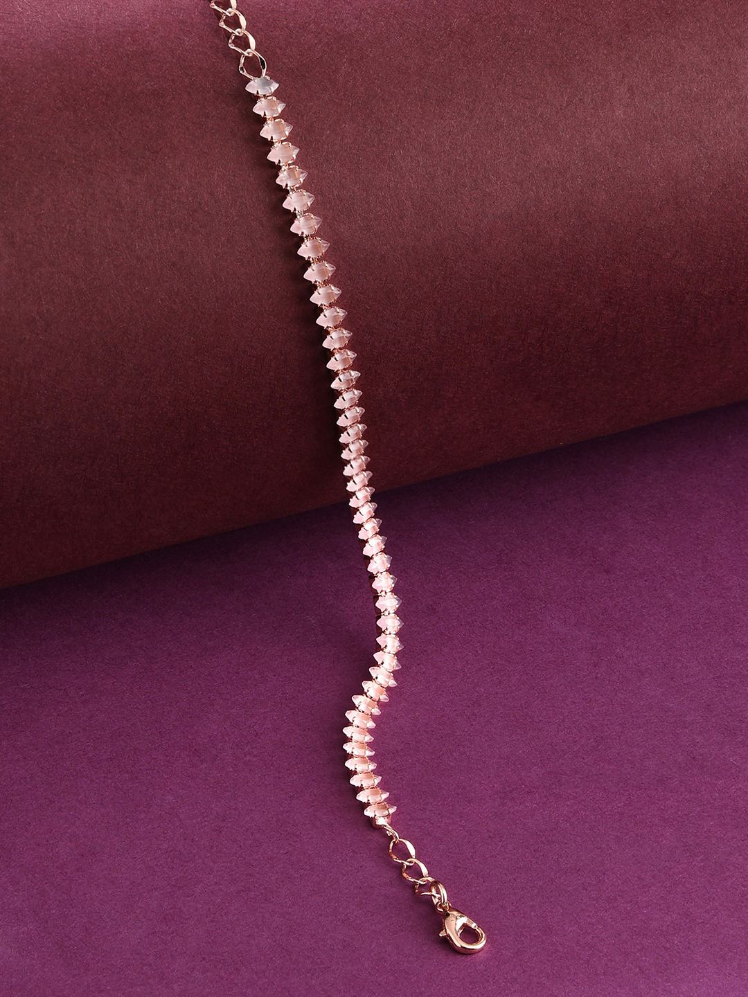 Zaveri Pearls Women Pink Brass Cubic Zirconia Rose Gold-Plated Wraparound Bracelet Price in India