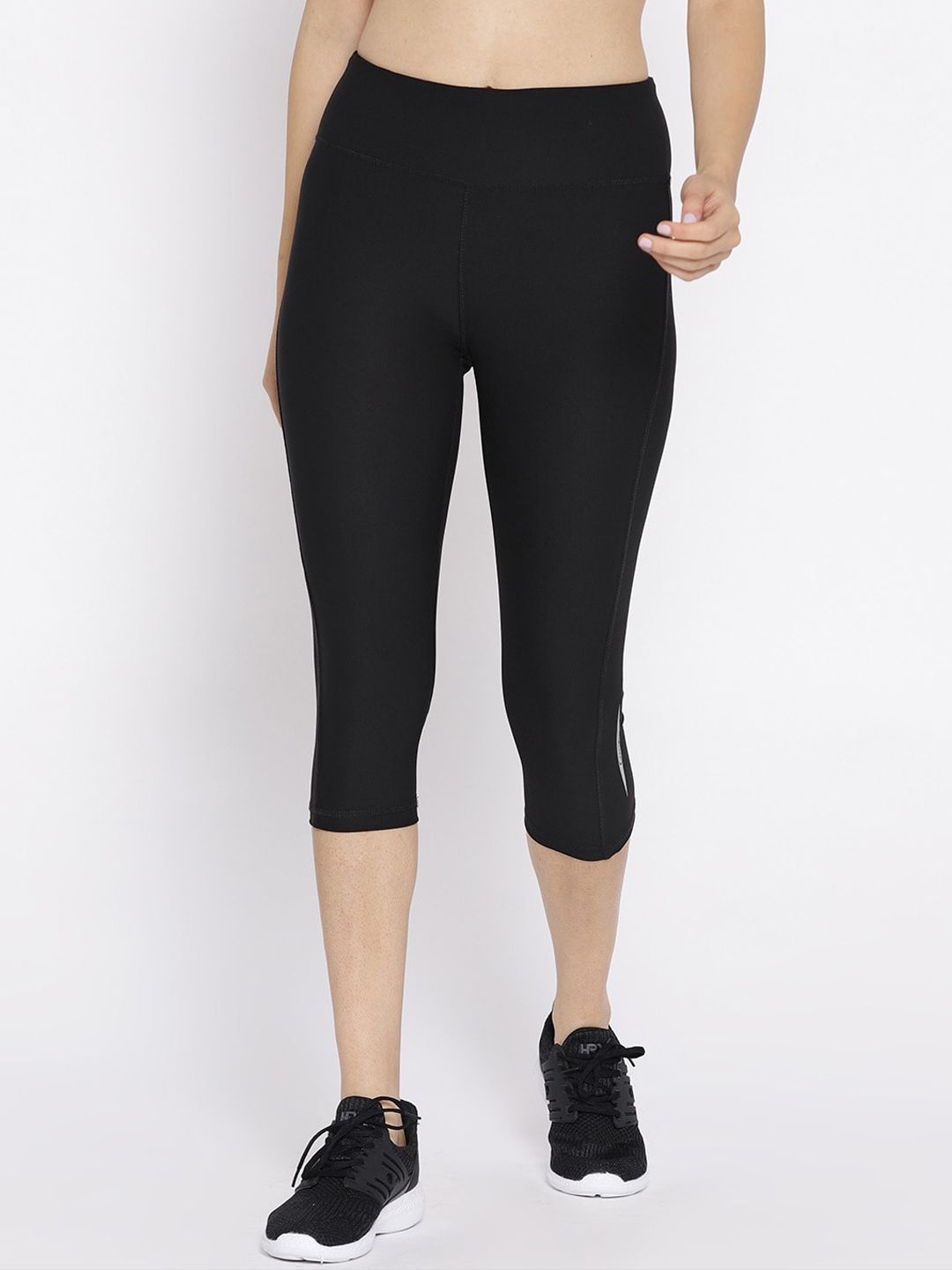 Kanvin Women Black Solid Calf Length Training Tights Price in India