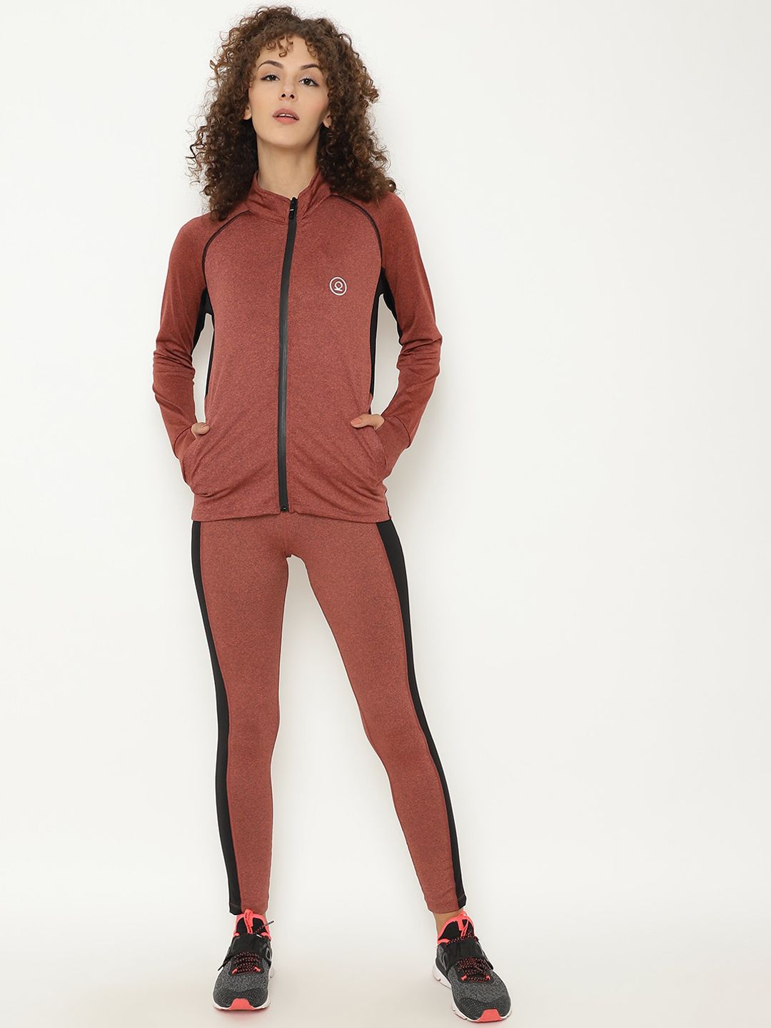 Chkokko Women Rust & Black Solid Tracksuits Price in India