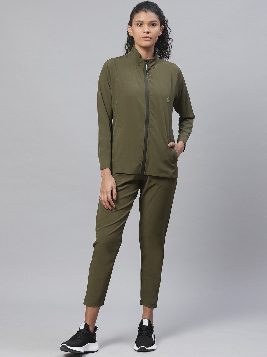 Chkokko Women Bottle Green Solid Tracksuits Price in India