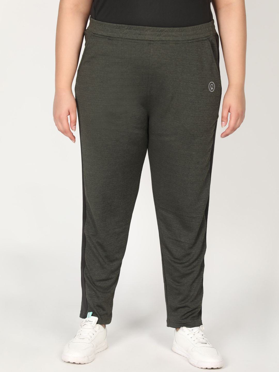 CHKOKKO Plus Women Olive Green Solid Track Pants Price in India