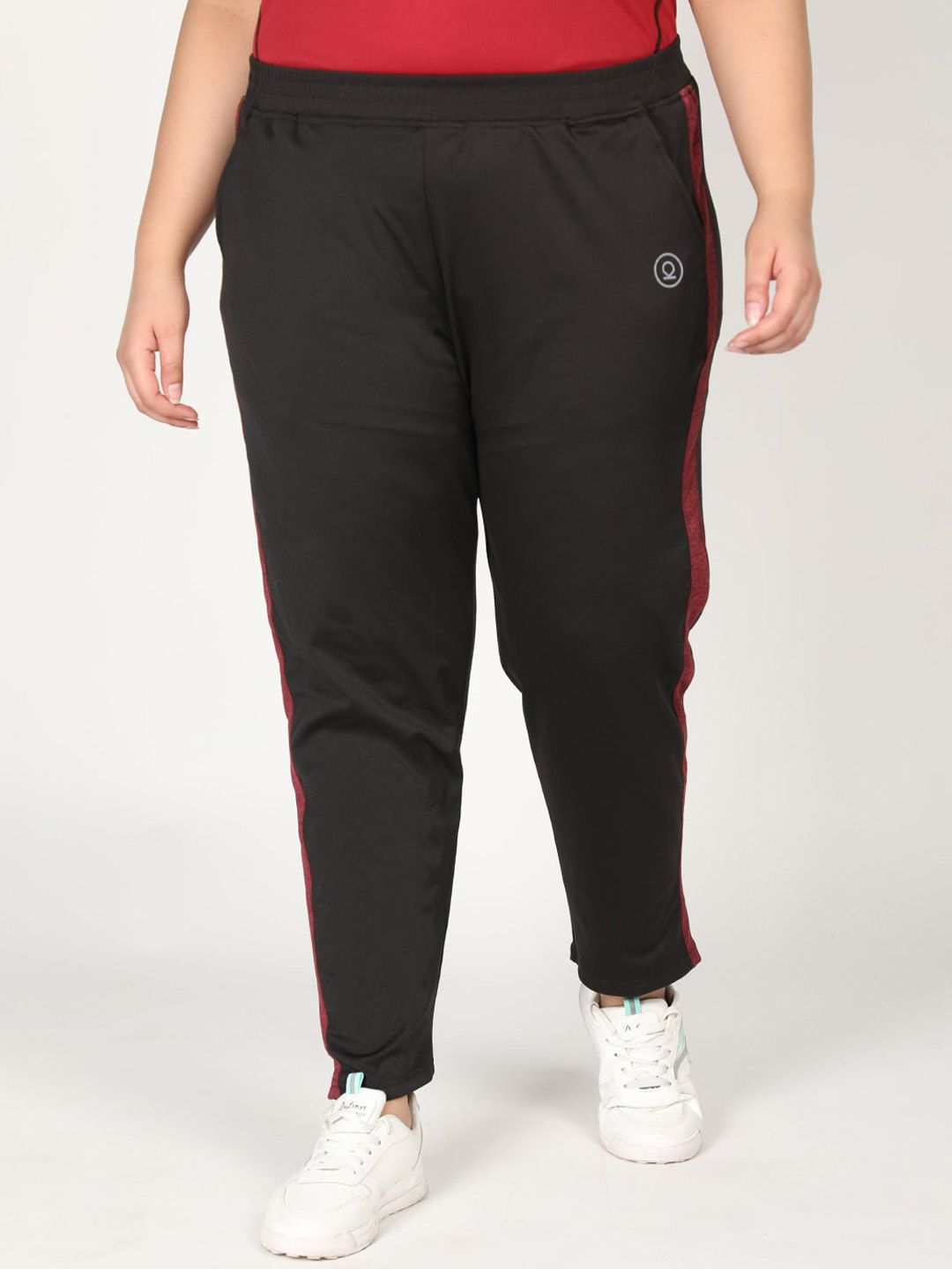 CHKOKKO Plus Women Black Solid Track Pants Price in India