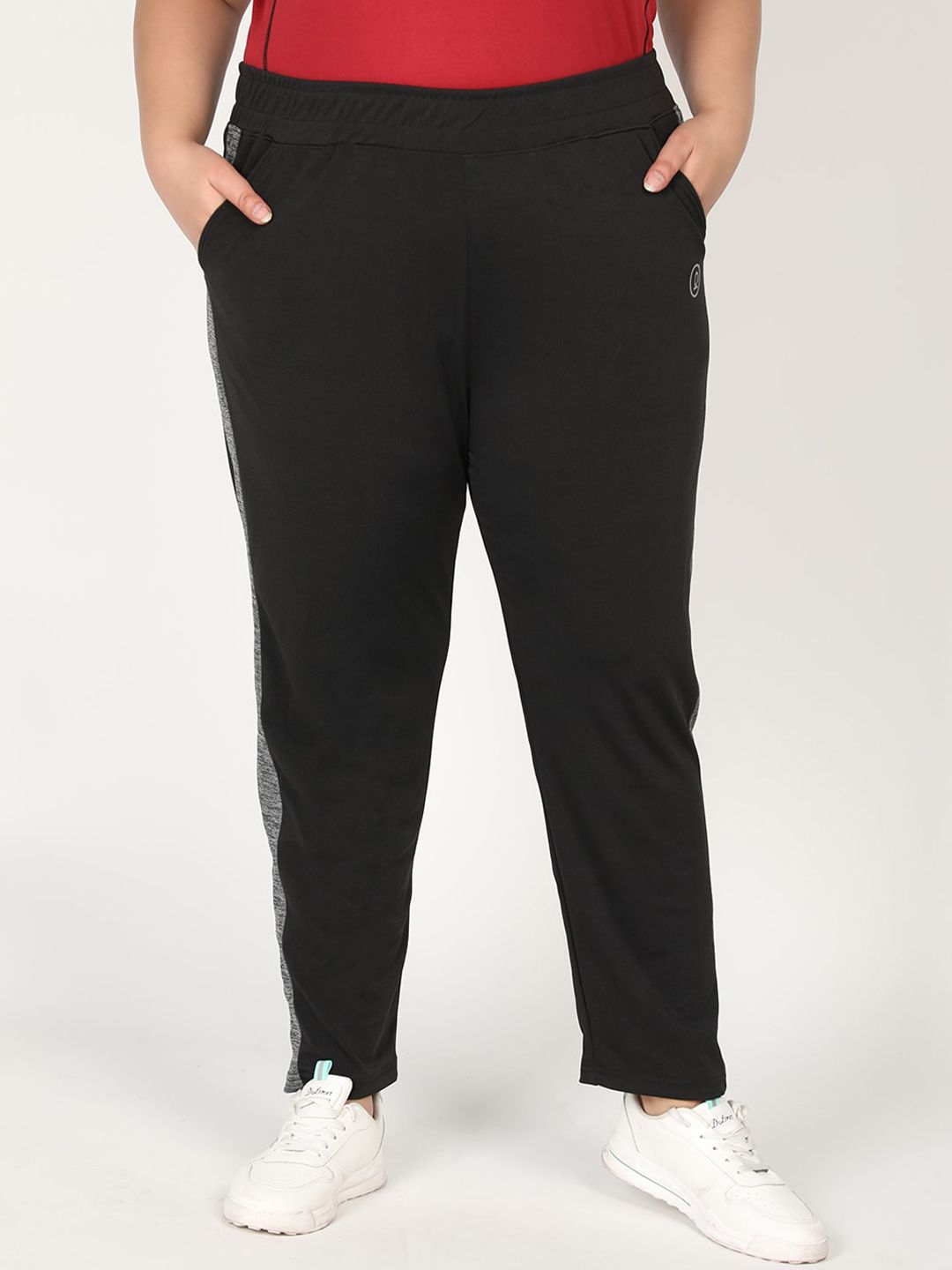 CHKOKKO Plus Women Black Solid Track Pants Price in India