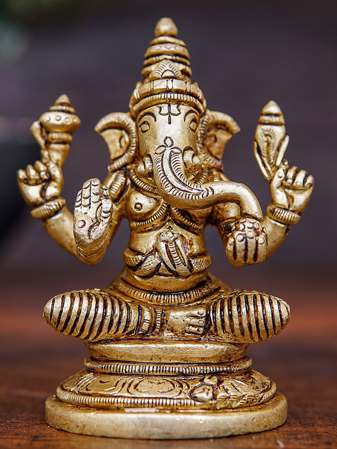 StatueStudio Gold-Toned Ganesha Idol Brass Showpieces Price in India