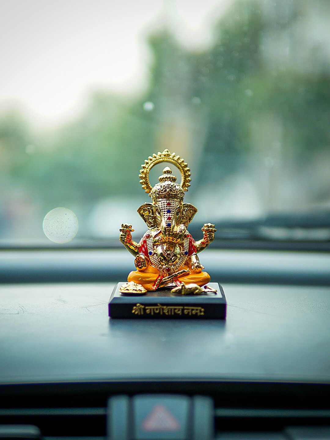 StatueStudio Gold-Toned & Yellow Ganesha Idol Polyresin Showpieces Price in India