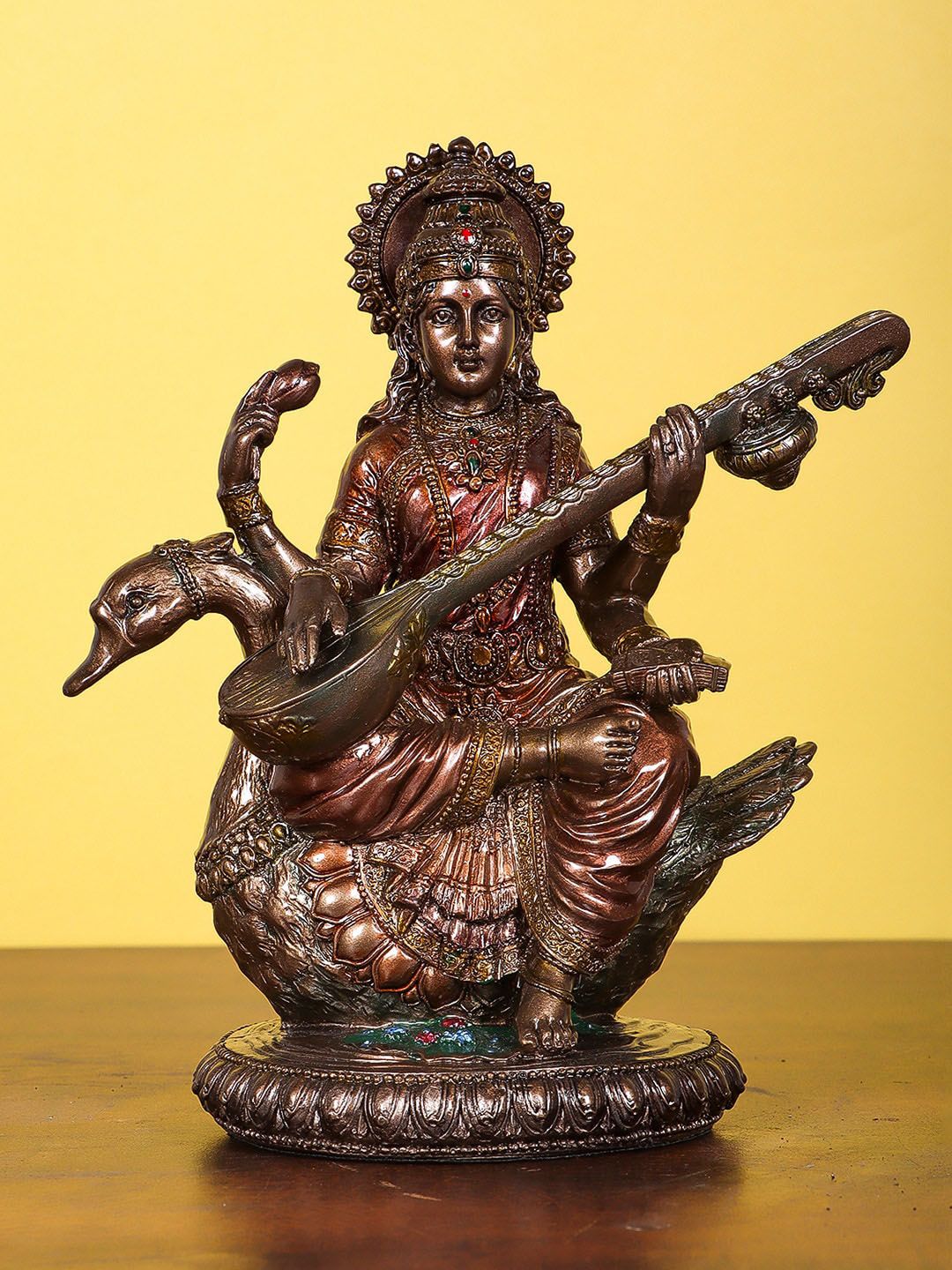 StatueStudio Bronze Saraswati Idol Sitting On Swan Bronze Look Pooja Showpieces Price in India