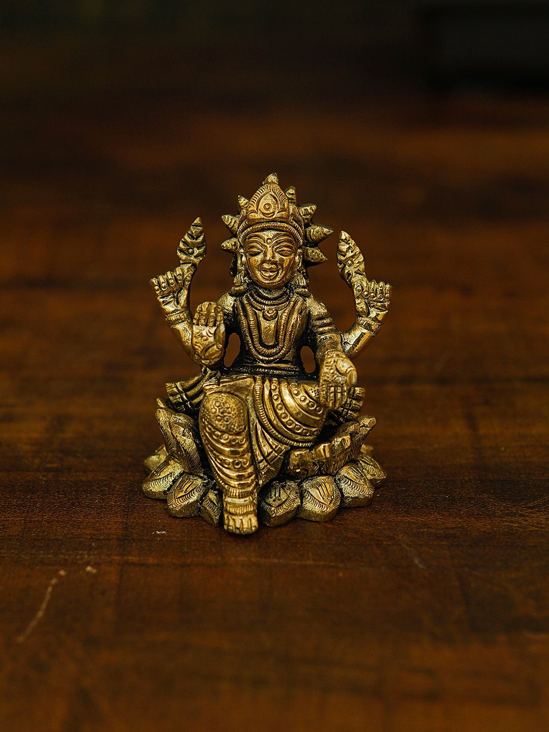 StatueStudio Glossy Antique Gold Lakshmi Idol Showpieces Price in India