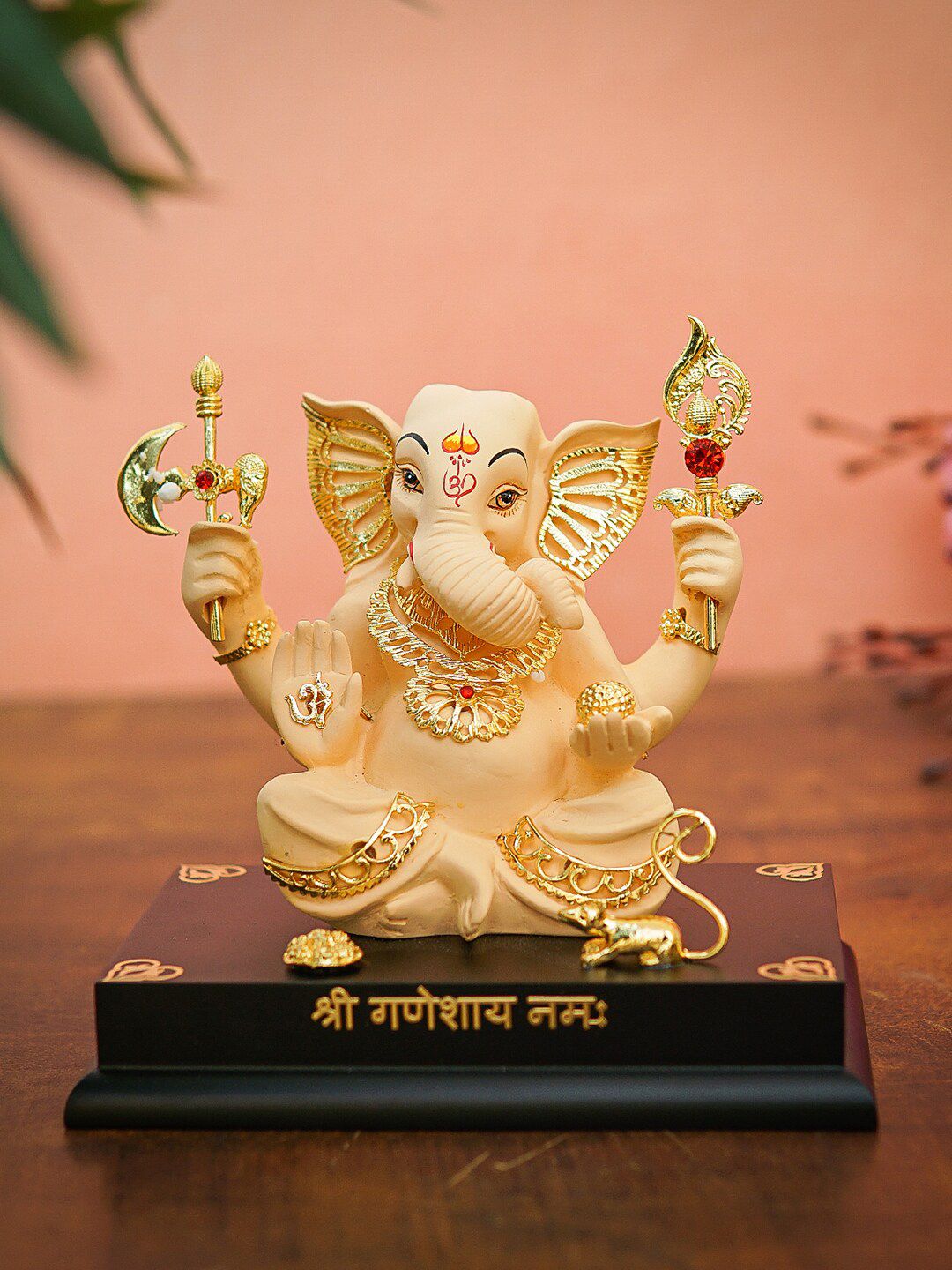 StatueStudio Gold-Toned & Peach-Colored Textured Ganpati Statue On Base Showpiece Price in India