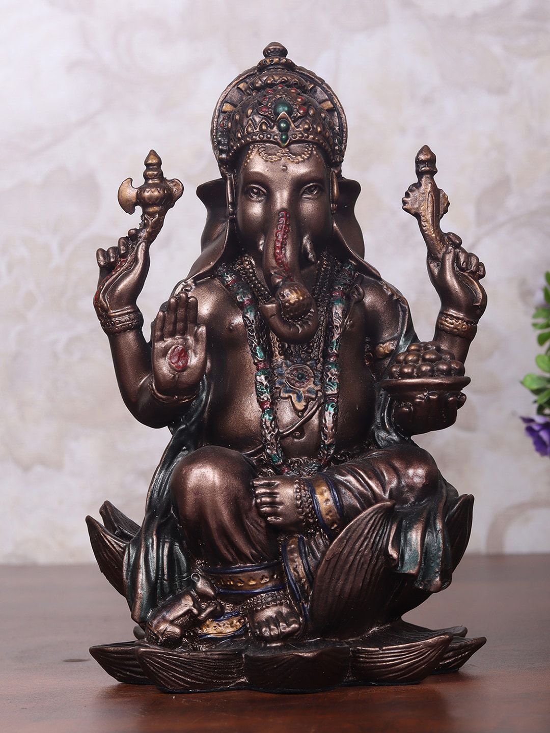 StatueStudio Bronze-Toned Ganesha Idol Sitting On Lotus Showpieces Price in India