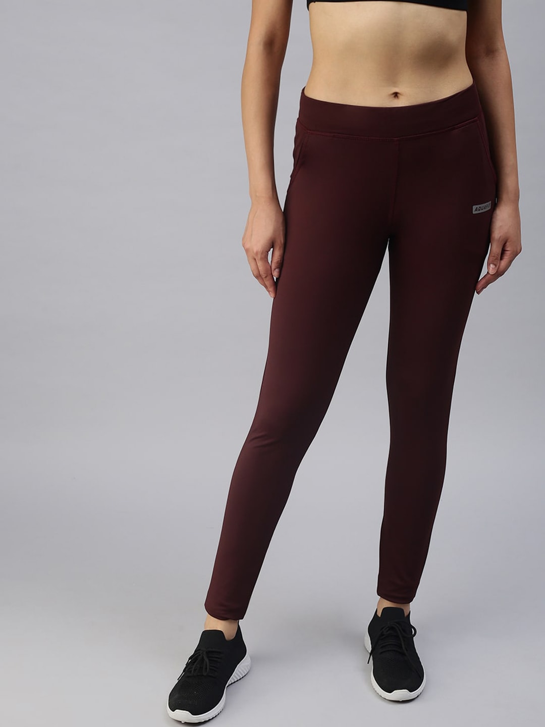 SHOWOFF Women Burgundy Slim Fit Solid Dry-Fit Tights Price in India