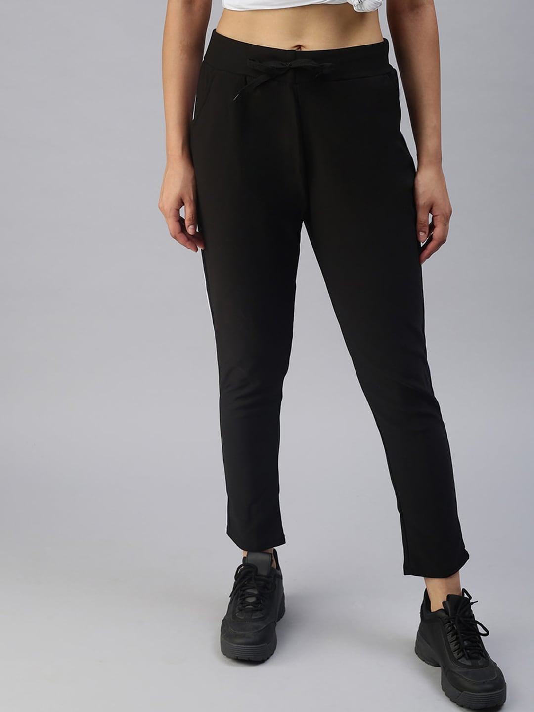 SHOWOFF Women Black Solid Slim Fit Dry Fit Regular Track Pants Price in India