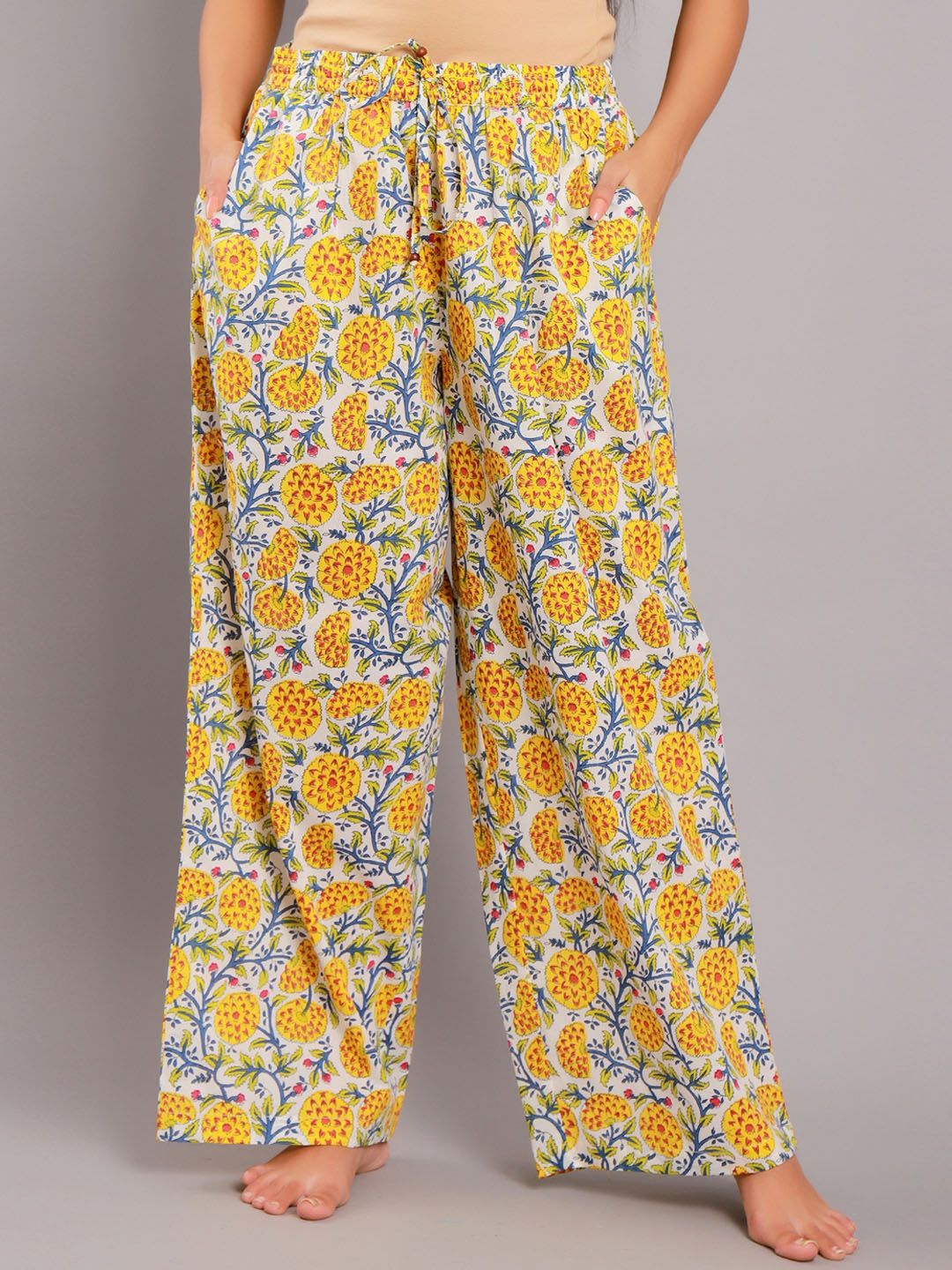 GAURANCHE Women Yellow Floral Print Flared Lounge Pants Price in India