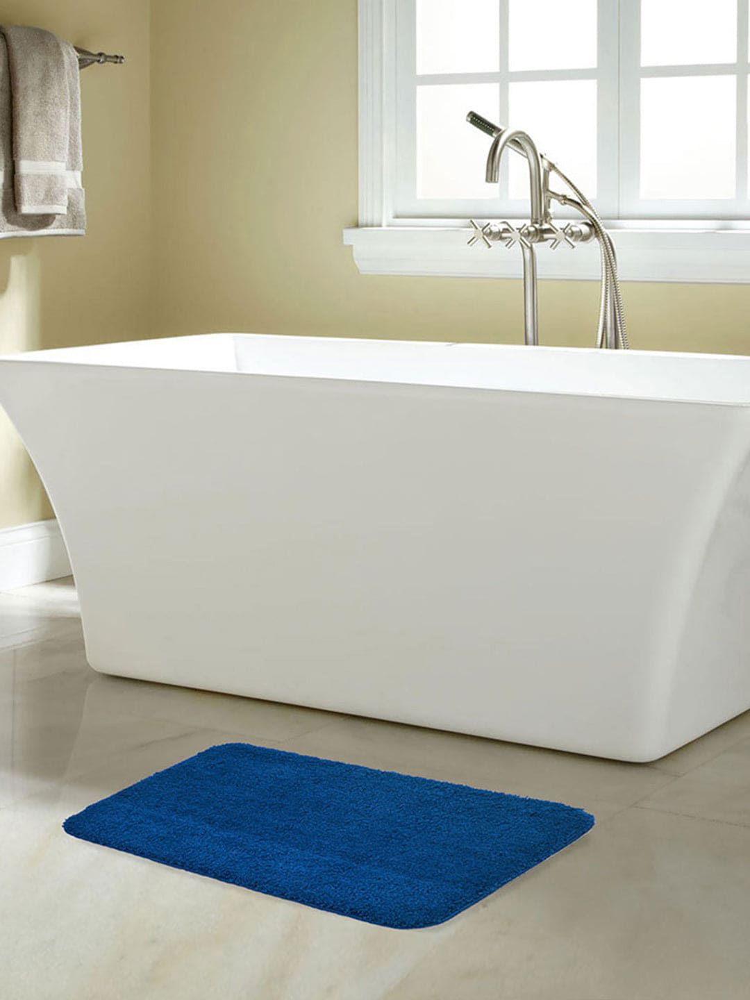 Athome by Nilkamal Blue Solid 2000 GSM Anti-Skid Bath Rug Price in India
