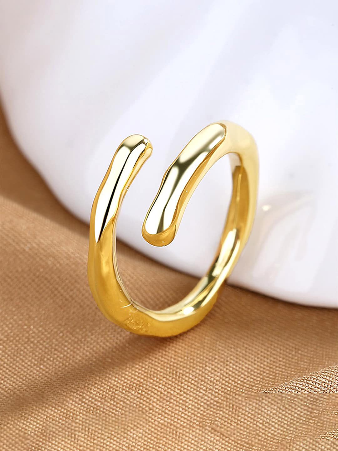 Unwind by Yellow Chimes Gold-Plated Adjustable Finger Ring Price in India