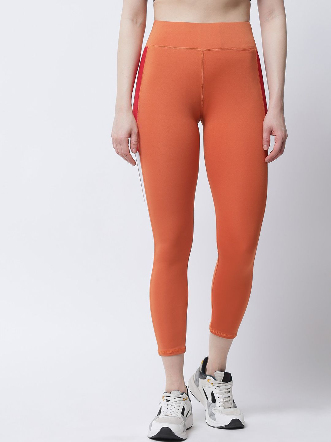 Tulsattva Women Orange Colorblocked Tights Price in India