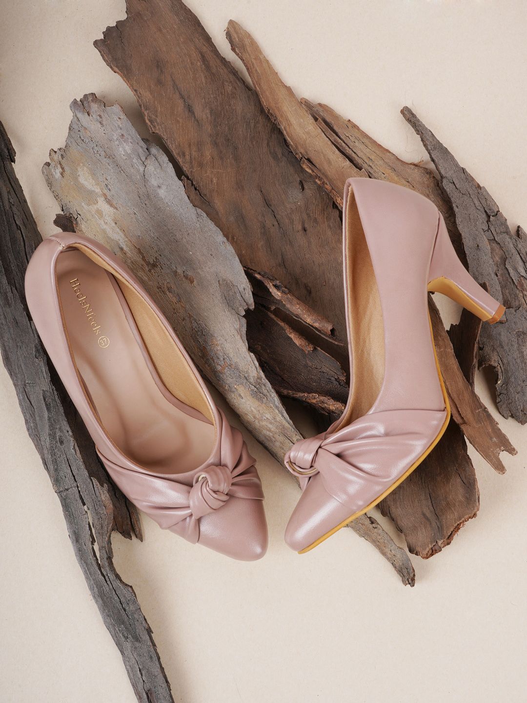 HEELSNFEELS Peach-Coloured Party Block Pumps with Bows Price in India