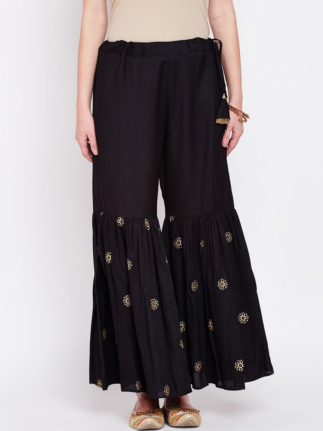 studio rasa Women Black & Gold-Toned Floral Printed Flared Ethnic Palazzos Price in India