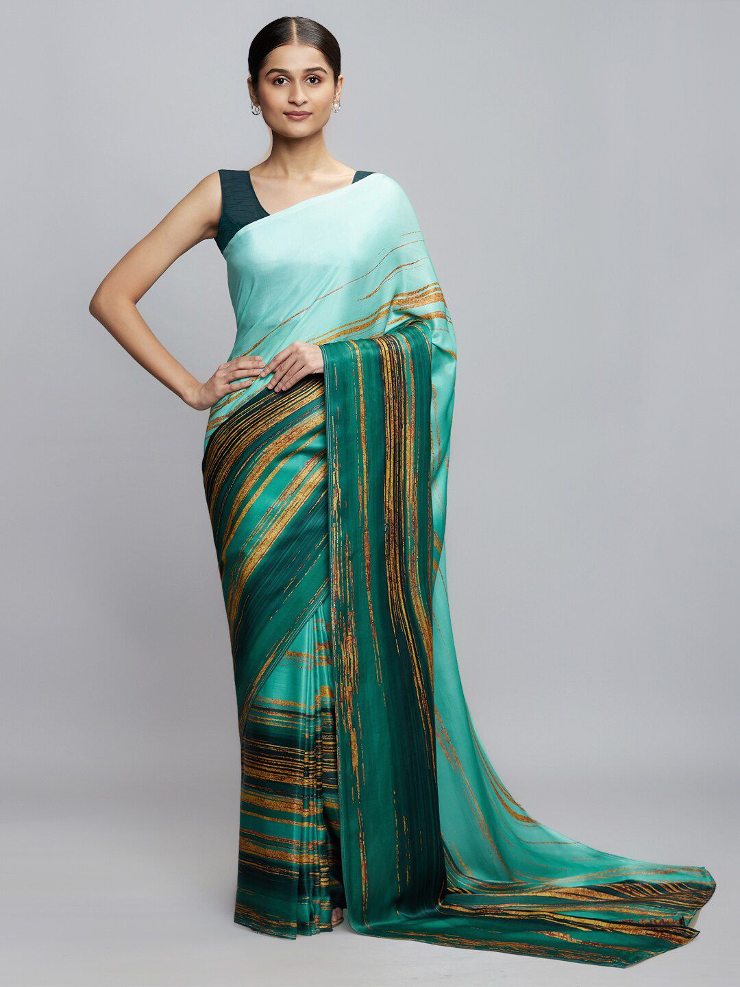 navyasa Blue & Gold-Toned Saree Price in India