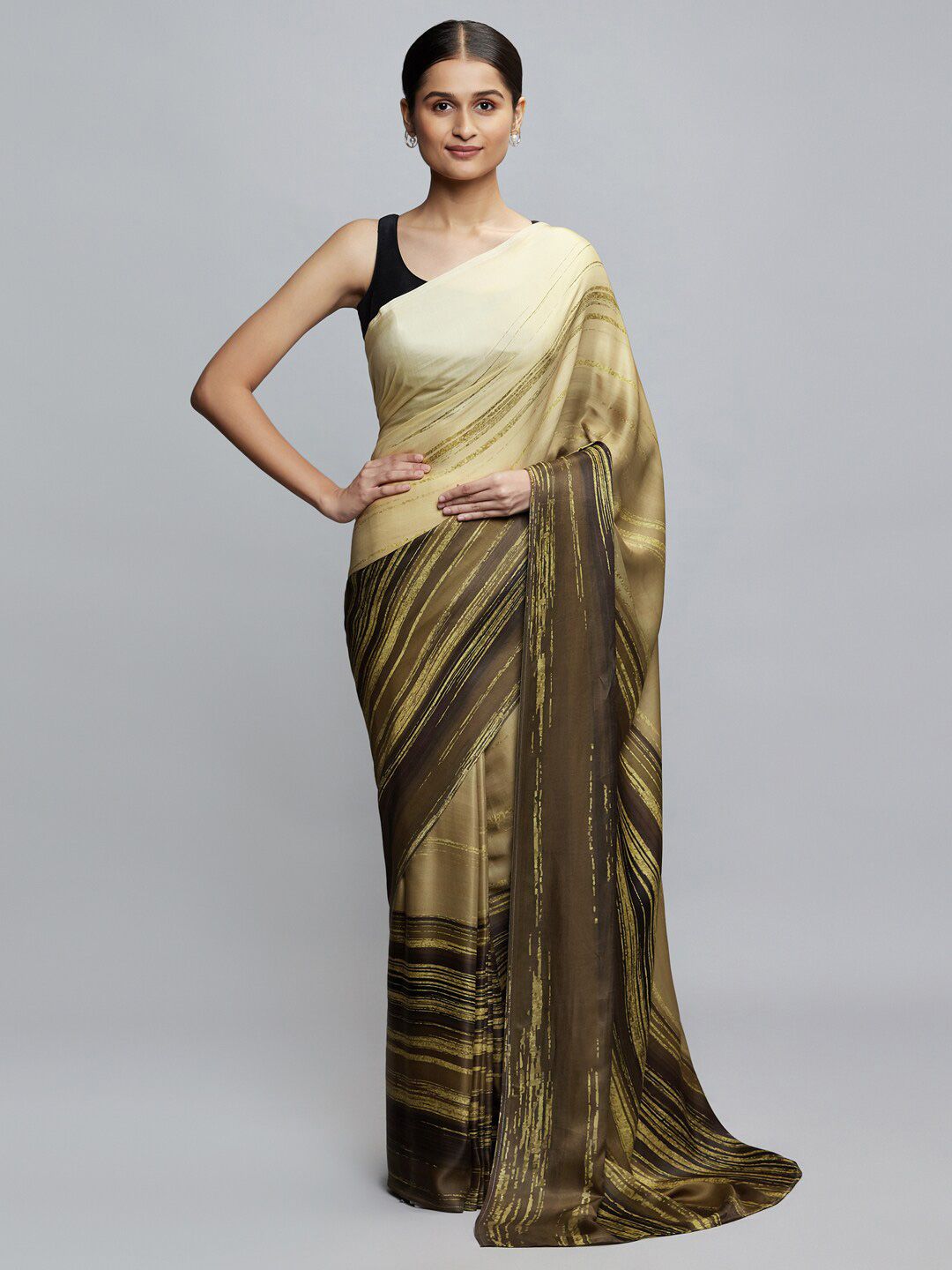 navyasa Cream-Coloured & Brown Striped Zari Saree Price in India