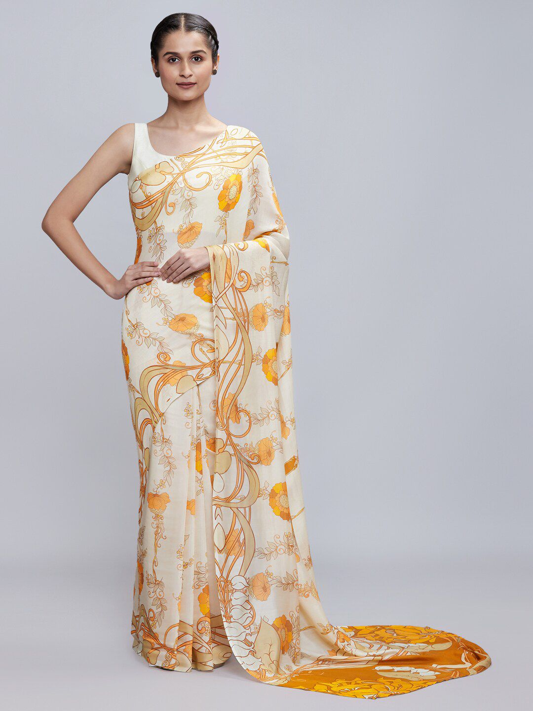 navyasa Orange & White Floral Saree Price in India