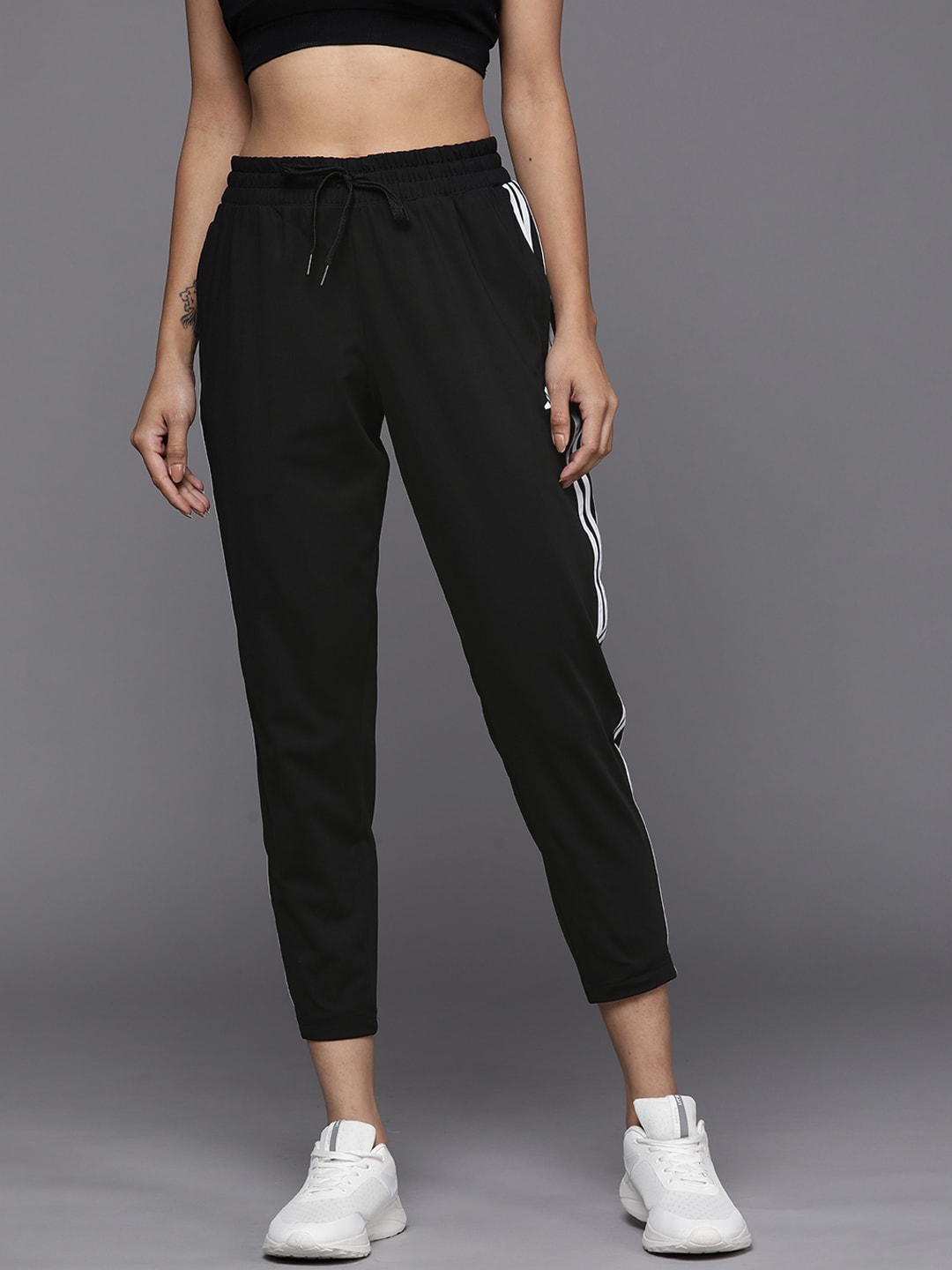 ADIDAS Women Black Solid Side Stripes Cropped Track Pants Price in India