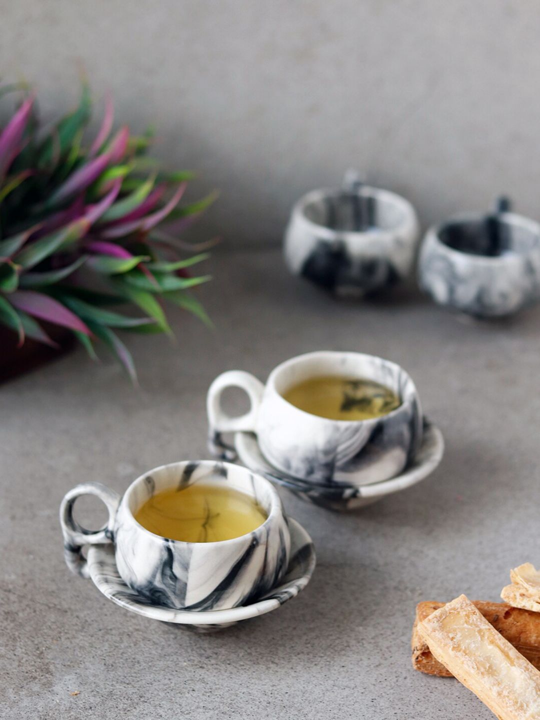 Unravel India Set Of 6 White & Black Printed Ceramic Matte Cups and Saucers Price in India