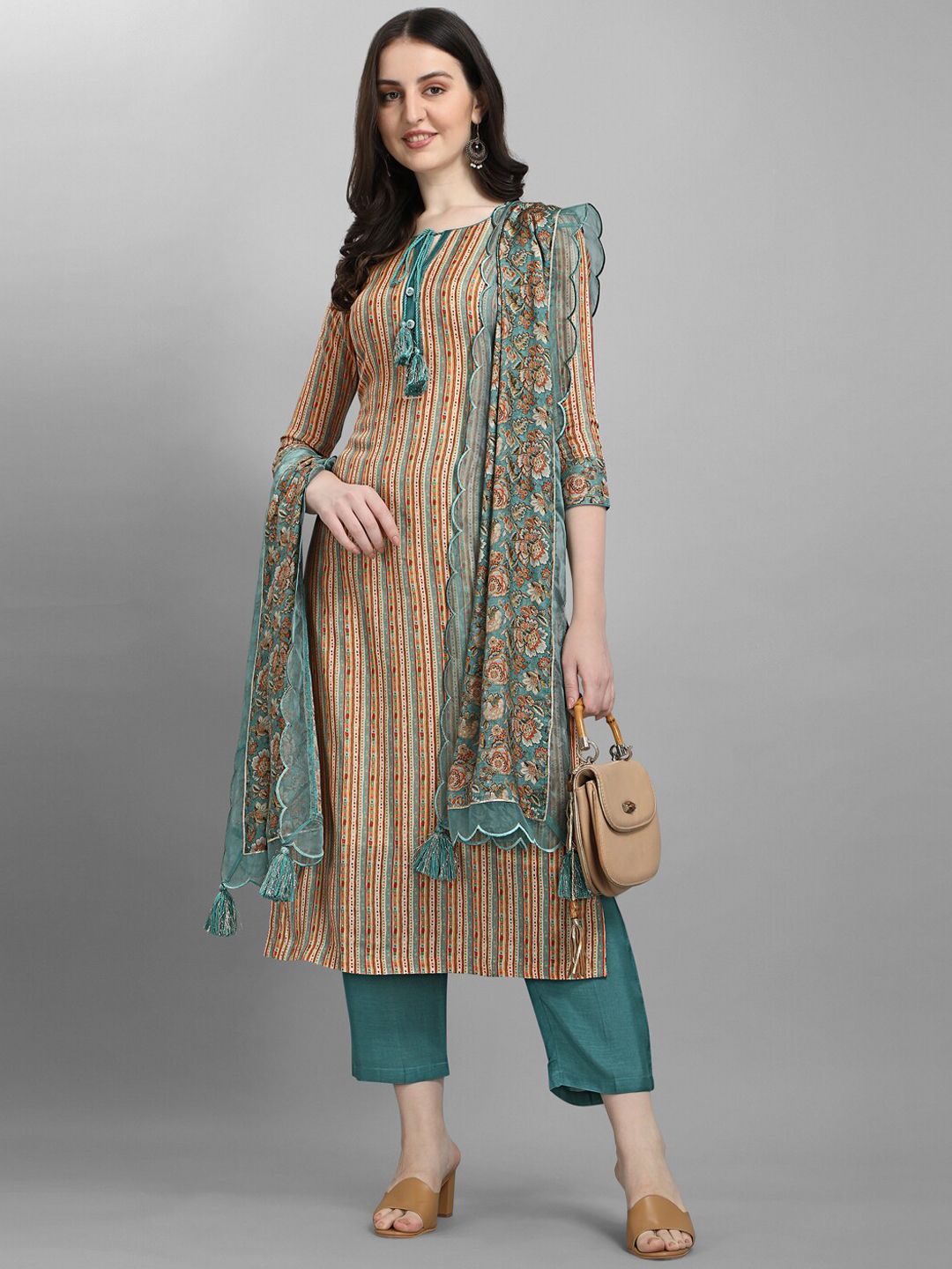 Seerat Women Teal Embroidered Pleated Silk Crepe Kurti with Trousers Price in India