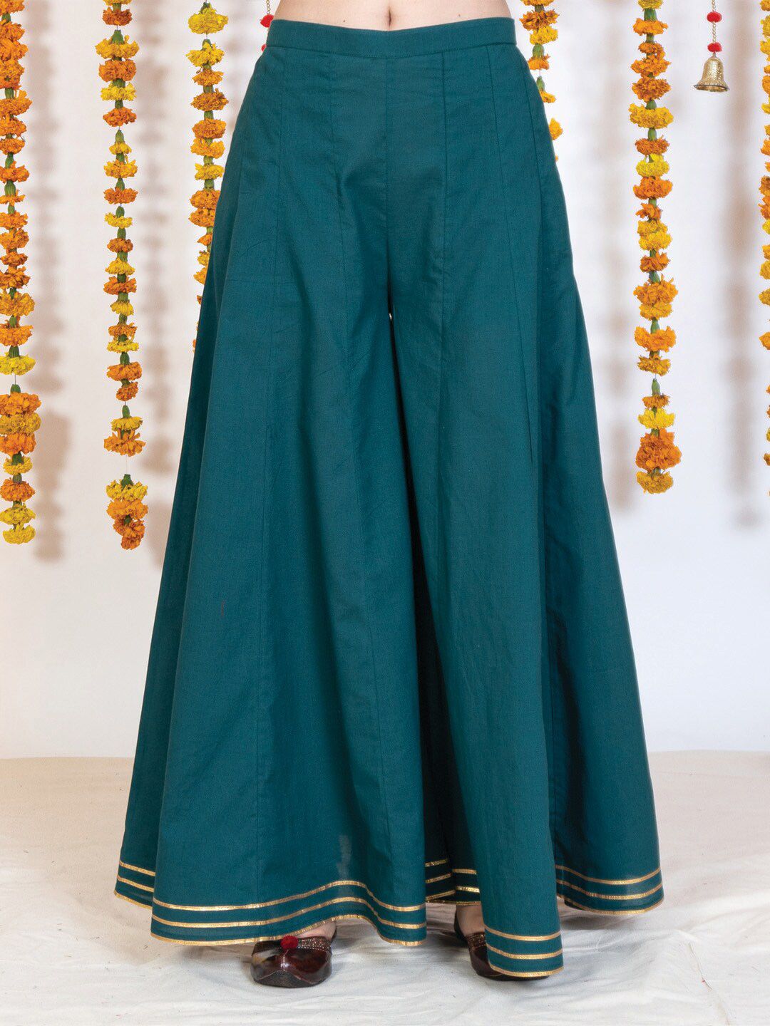 AKISO Women Green & Gold-Toned Flared Ethnic Palazzos Price in India