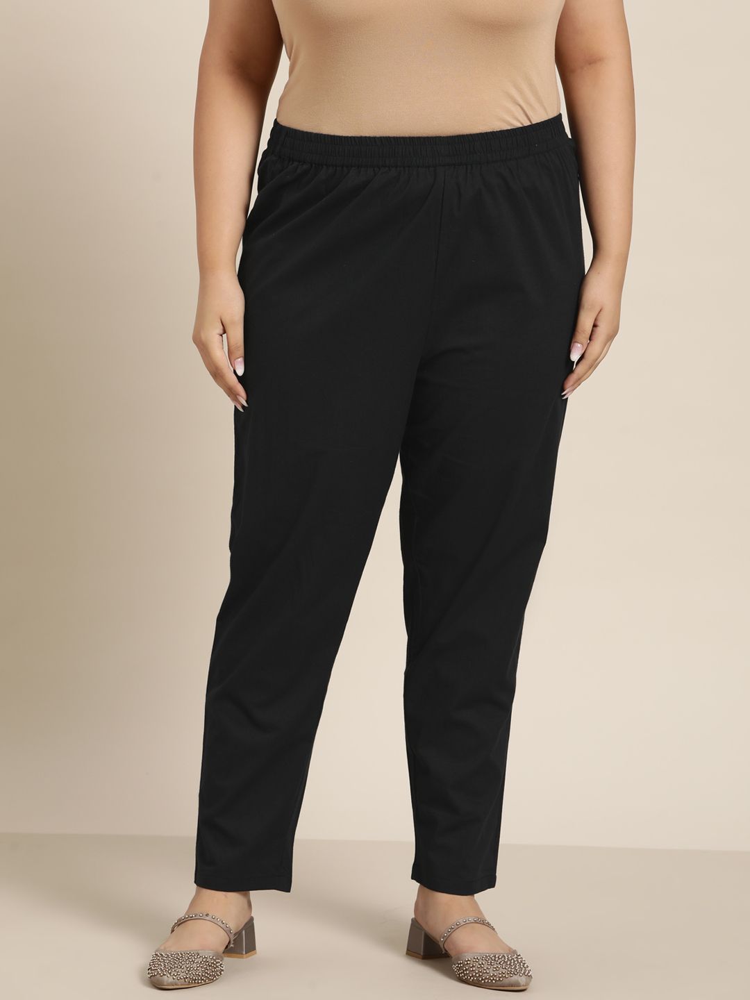 Sztori Women Black Solid Pure Cotton Tapered Fit Trousers Price in India
