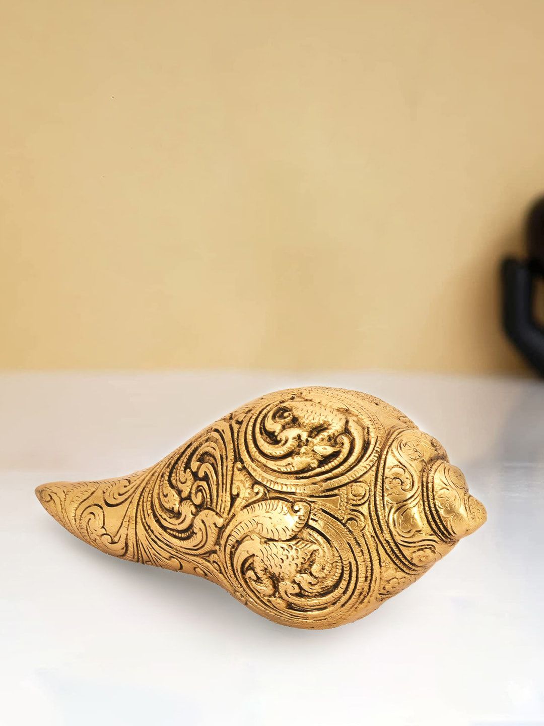 CraftVatika Gold-Toned Textured Conch Vishnu Lakshmi Shell Shankh Showpieces Price in India