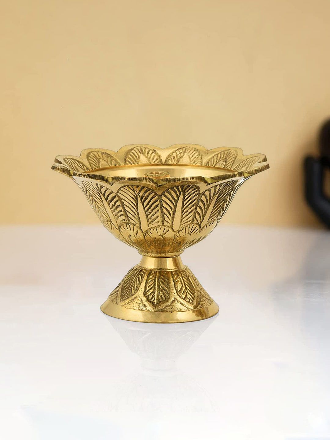 Craftvatika Gold-Toned Brass Engraved Diya Price in India