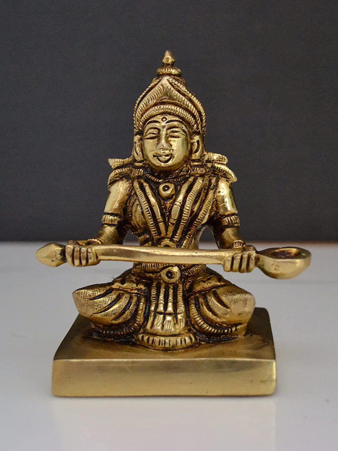 CraftVatika Gold-Toned Goddess Devi Annapurna with Fine Carving Idol Showpieces Price in India