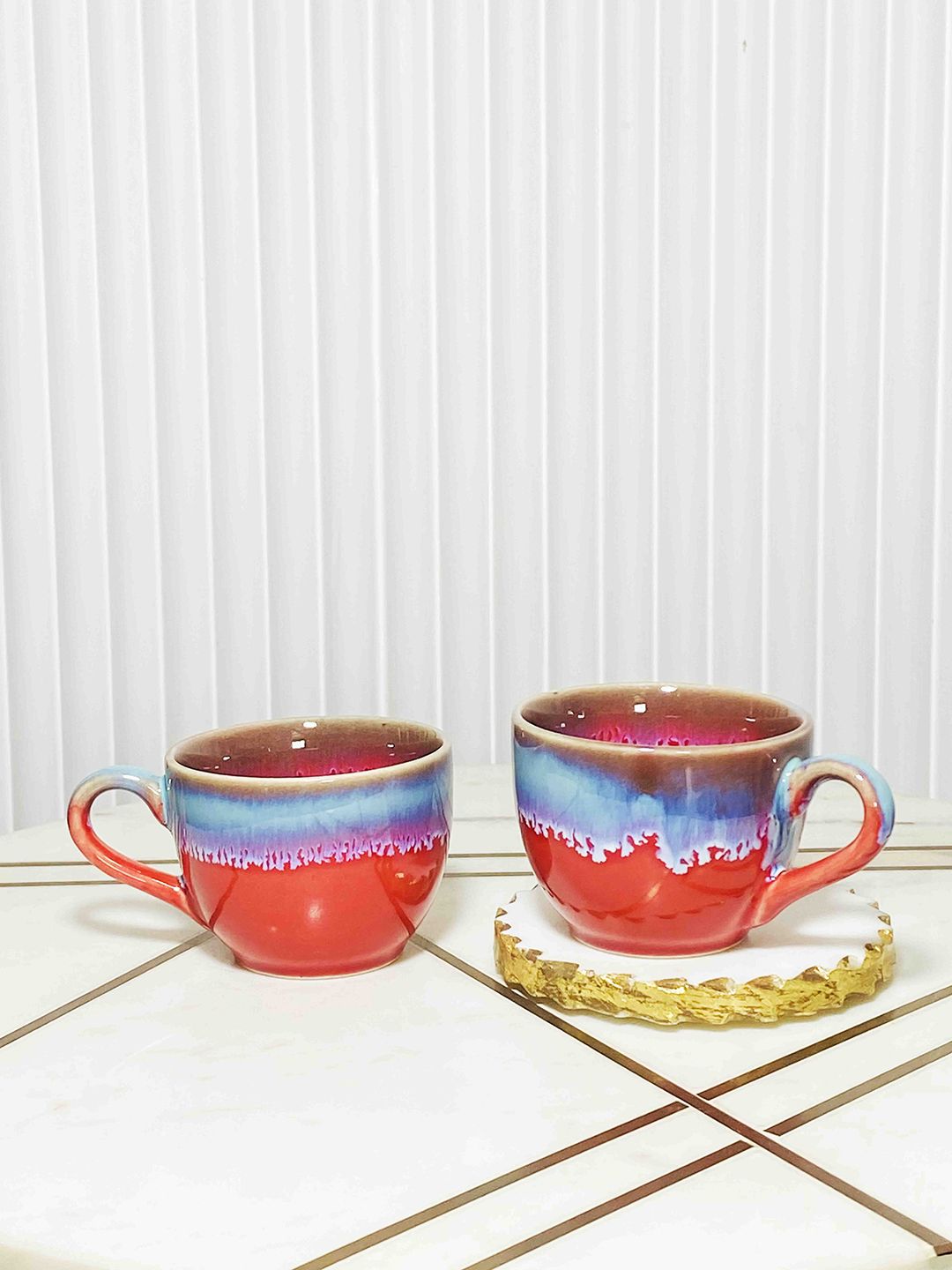 Folkstorys 2 Pieces Red & Blue Hand Painted Textured Ceramic Glossy Cups Set Price in India