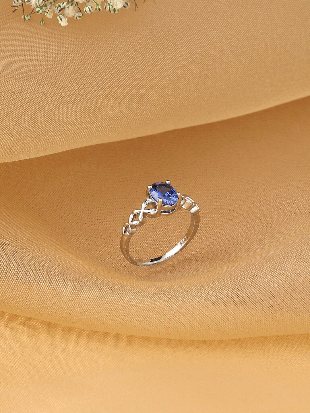 Unwind by Yellow Chimes Silver-Plated Blue Crystal Studded Handcrafted Finger Ring Price in India