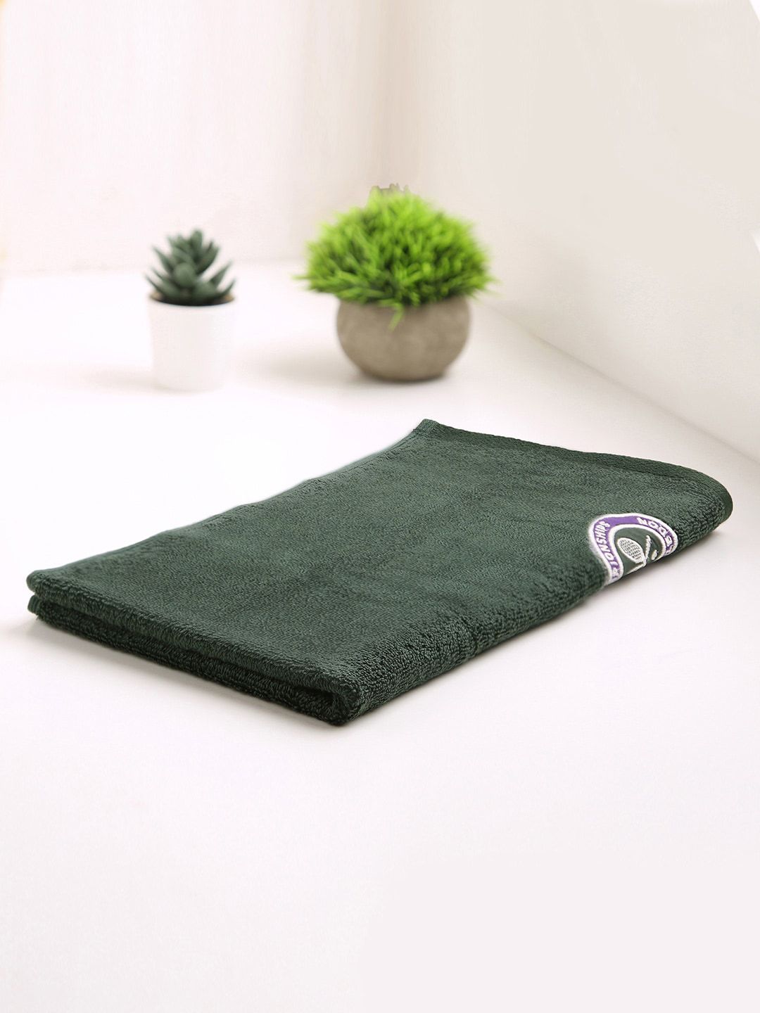 SPACES Green Solid 520 GSM Pure Cotton Hand Towels Price in India