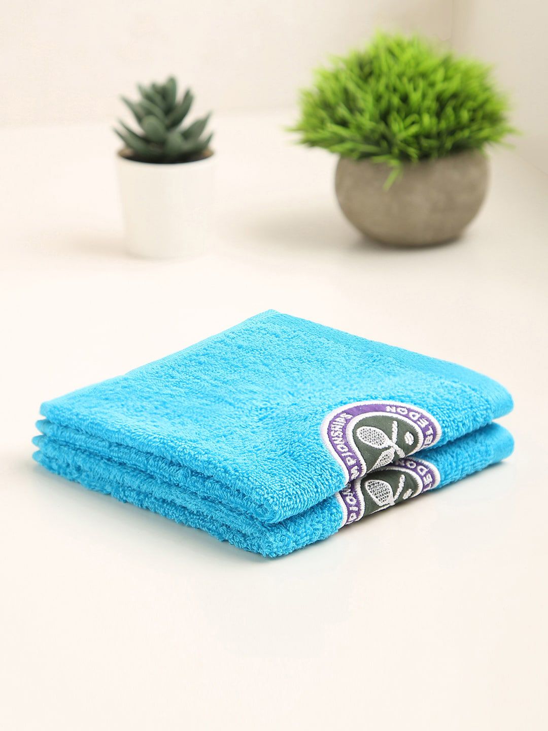 SPACES Set Of 2 Blue Solid 520 GSM Pure Cotton Face Towels Price in India
