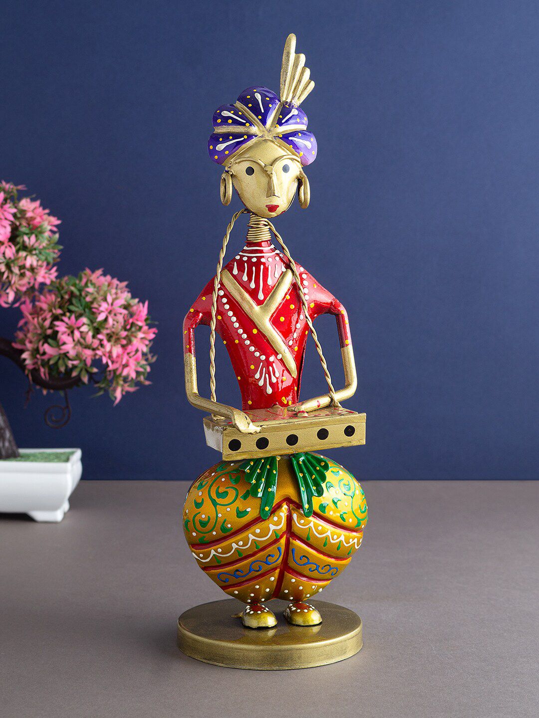 Golden Peacock Red & Gold-Coloured Musician Figurine Showpieces Price in India