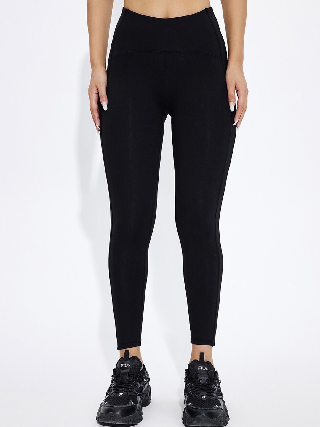 URBANIC Women Black Solid Gym Tights Price in India