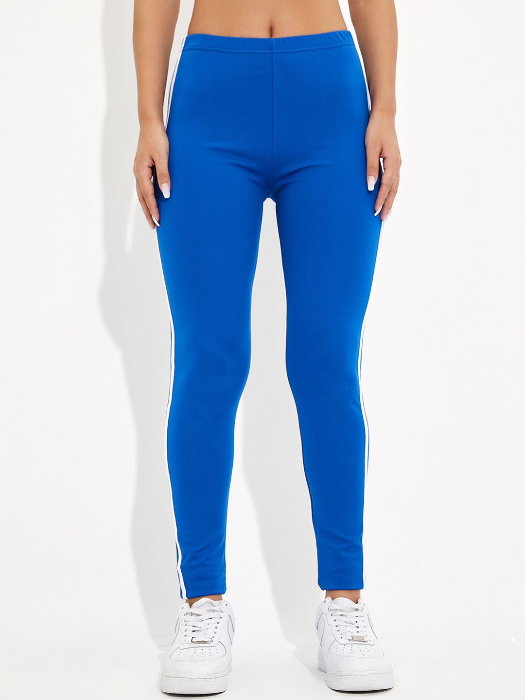 URBANIC Women Blue Solid Gym Tights Price in India